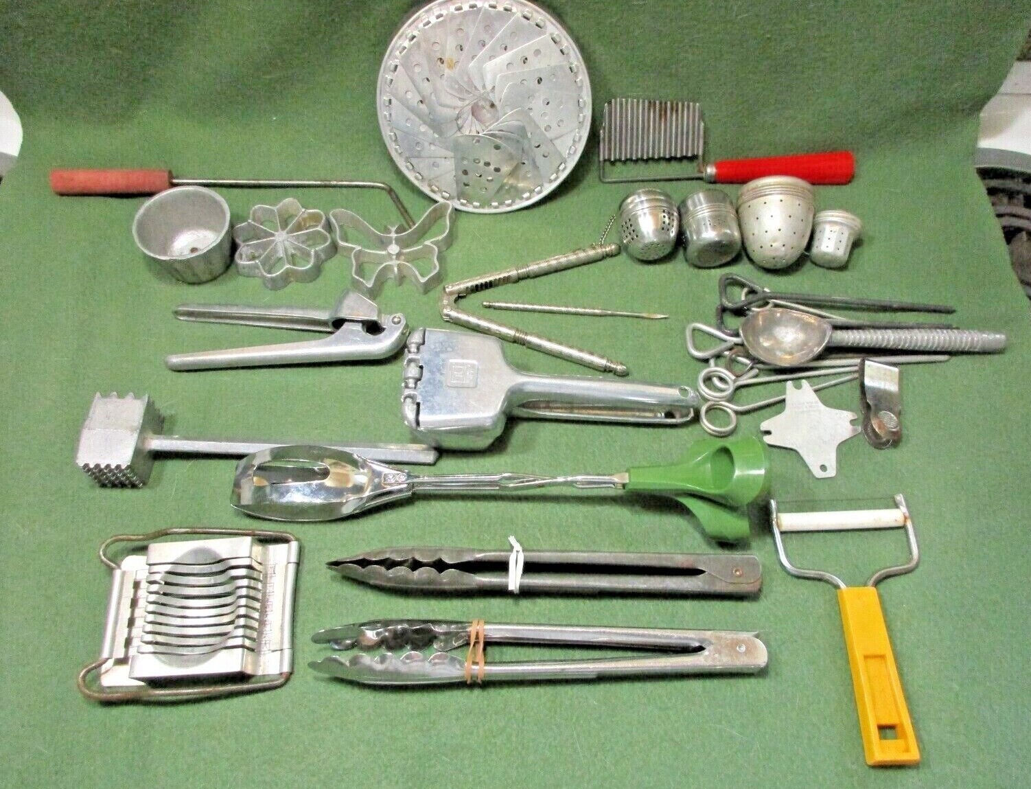 Handy Kitchen Utensils, Tongs, Egg Slicer, Nutracker, Steamer, Tea Balls, Cutter