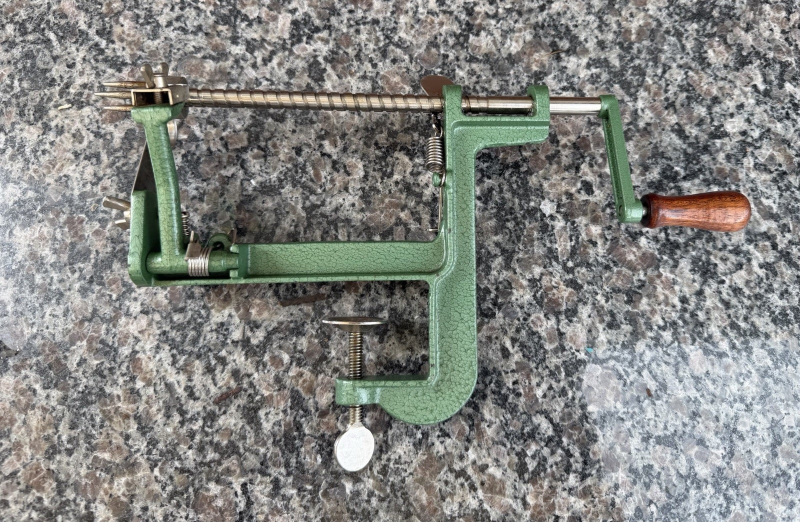 vintage hand crank green cast iron apple parer, corer, and slicer wooden handle