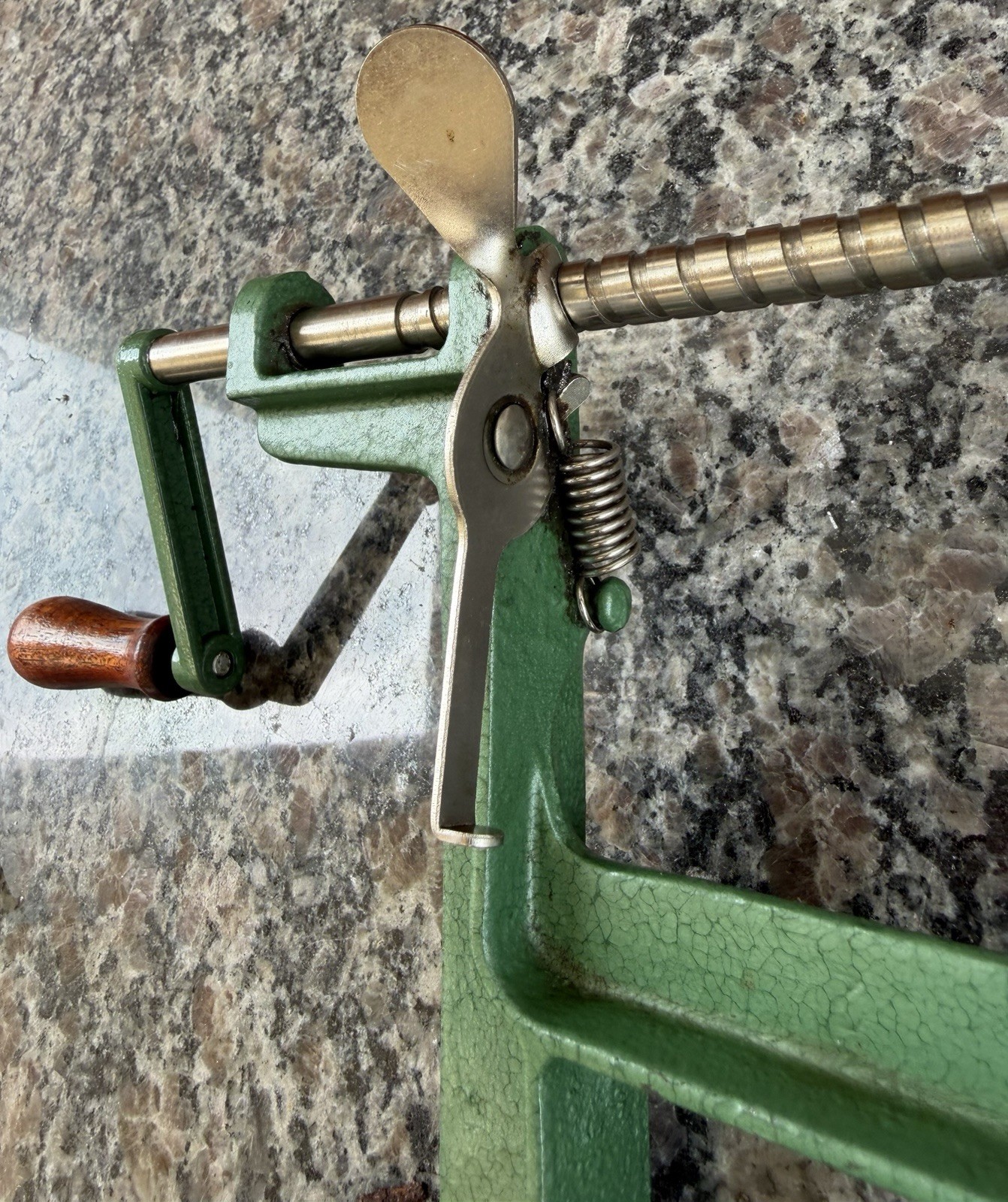 vintage hand crank green cast iron apple parer, corer, and slicer wooden handle